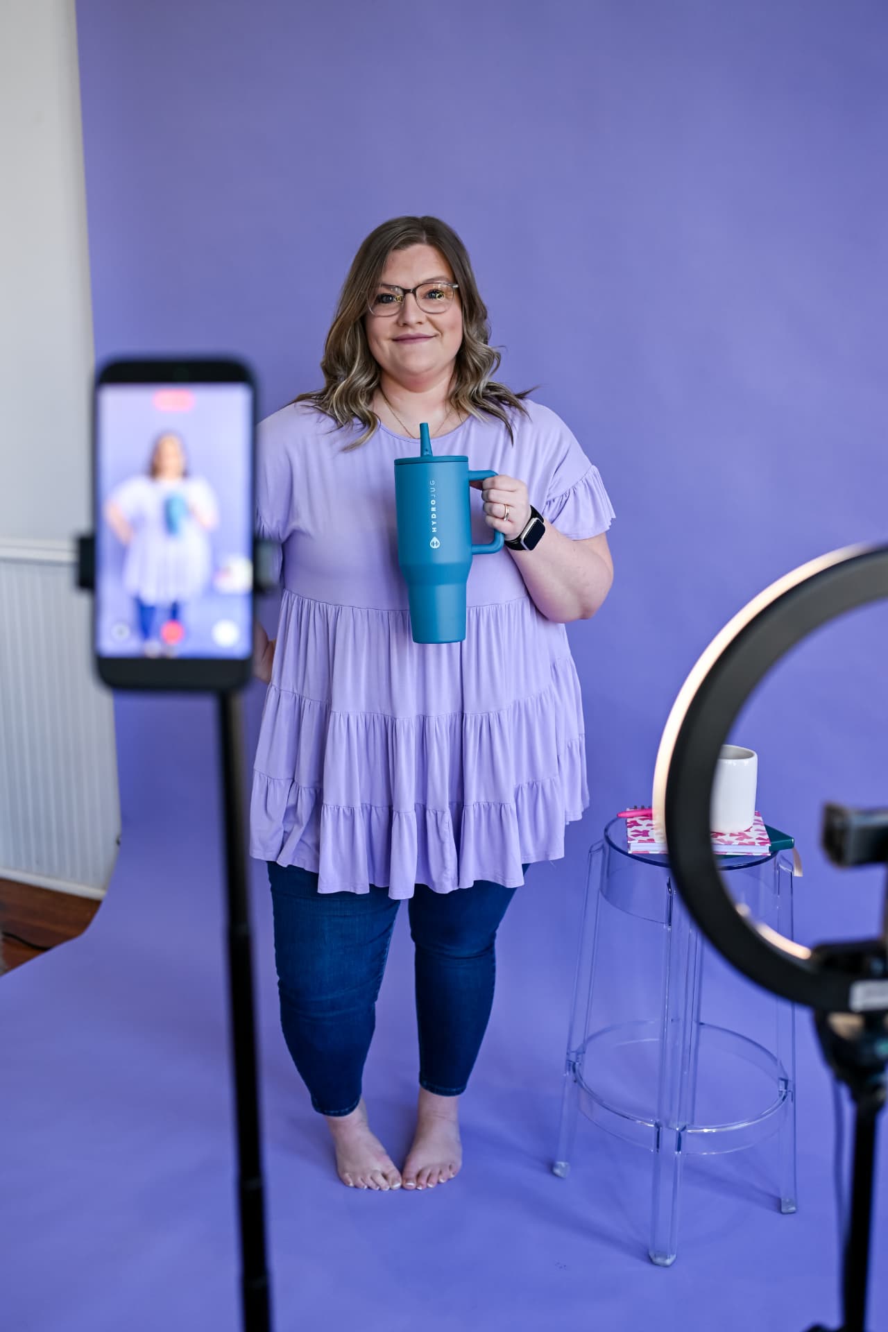 Shelb filming content in front of her ring light